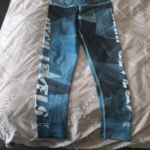 Dynamic Teal Geometric Compression Leggings